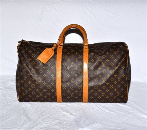 lv green duffle bag|Lv duffle bag women's.